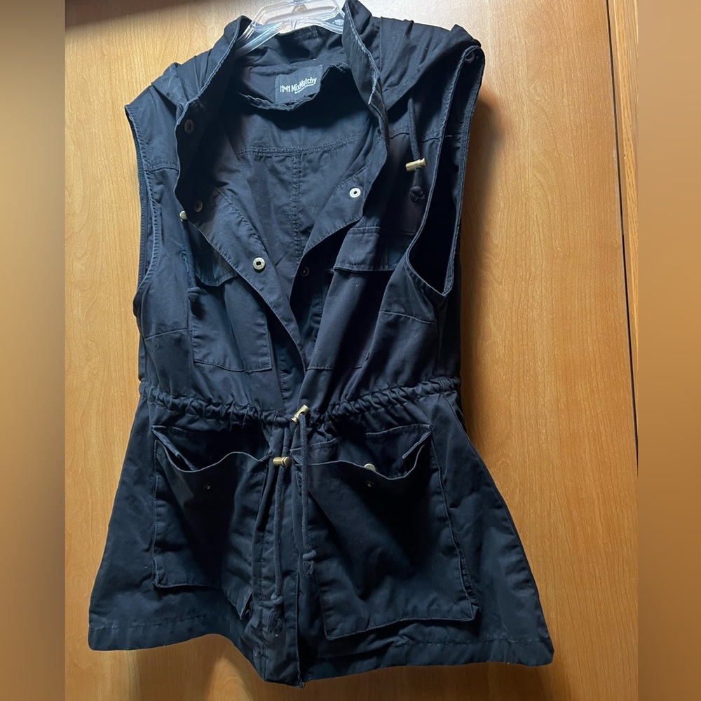 Utility style vest with cinch waist. Cotton and comfortable.